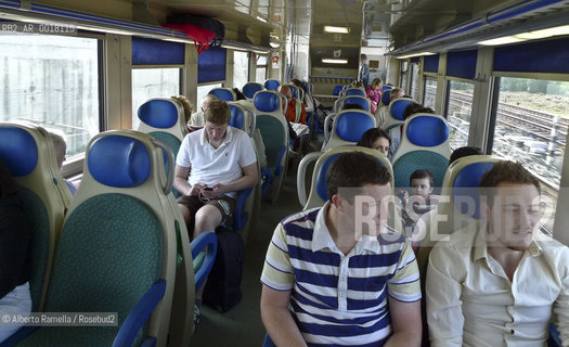 passeggeri su treno ©Alberto Ramella/Rosebud2