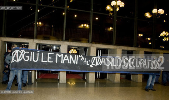 opening torino film festival 2009, teatro regio di torino, as squatters occupied theatre for protest against occupied houses clearing, director gianni amelio presents actor aaron johnson and film director sam wood-taylor for nowhere boy based on john lennons story..in the picture: a moment of the squatter theatre occupation ©Alberto Ramella/Rosebud2