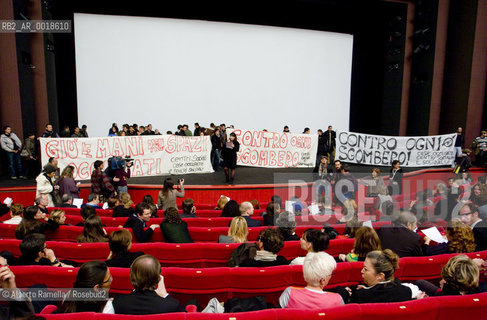 opening torino film festival 2009, teatro regio di torino, as squatters occupied theatre for protest against occupied houses clearing, director gianni amelio presents actor aaron johnson and film director sam wood-taylor for nowhere boy based on john lennons story..in the picture: a moment of the squatter theatre occupation ©Alberto Ramella/Rosebud2