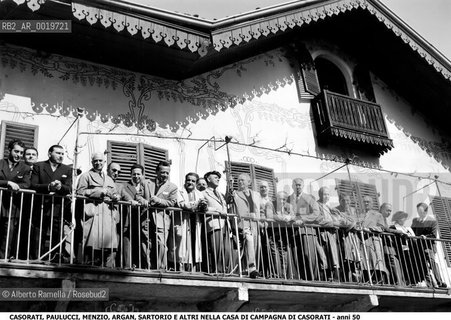 Casorati, Felice (1886–1963), Italian painter. Influenced by Beardsley and other English engravers, Casorati, together with Carrà, was involved in the symbolist movement. He was instrumental in the formation of the metaphysical school. in the pict casorati and friends on the balcony of his Pavarolos home ©Alberto Ramella/Rosebud2