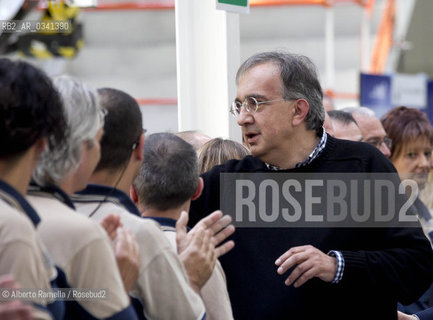 30.06.14, Grugliasco (To), Stabilimento Maserati, Ass Annuale Confindustria Torino - nella foto: Catena di montaggio Maserati, Sergio Marchionne e John P Elkanno in visita allo Stabilimento ©Alberto Ramella/Rosebud2