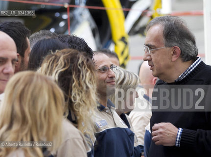 30.06.14, Grugliasco (To), Stabilimento Maserati, Ass Annuale Confindustria Torino - nella foto: Catena di montaggio Maserati, Sergio Marchionne e John P Elkanno in visita allo Stabilimento ©Alberto Ramella/Rosebud2