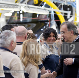 30.06.14, Grugliasco (To), Stabilimento Maserati, Ass Annuale Confindustria Torino - nella foto: Catena di montaggio Maserati, Sergio Marchionne e John P Elkanno in visita allo Stabilimento ©Alberto Ramella/Rosebud2