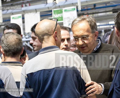 30.06.14, Grugliasco (To), Stabilimento Maserati, Ass Annuale Confindustria Torino - nella foto: Catena di montaggio Maserati, Sergio Marchionne e John P Elkanno in visita allo Stabilimento ©Alberto Ramella/Rosebud2