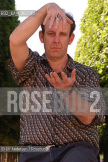 American writer Madison Smart Bell doing Tai Chi between his appointments. Paris, May 24, 2005 - ©Ulf Andersen/Rosebud2