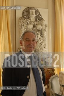 Greek writer Michel de Grece at home in Paris, with art works from Nikki de Saint Phalle and a painting by Larry Rivera representing Michel and different historicalroyalties in europe. Michel de Grece is still greek but descent from a danish king . Paris, March 1, 2007. ©Ulf Andersen/Rosebud2