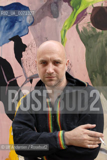 Russian writer Zakhar Prilepine with a painting from Fiona Valentine Thomann. Lyon, May 31, 2012 - ©Ulf Andersen/Rosebud2